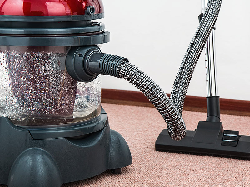 What are the functions of a vacuum cleaner